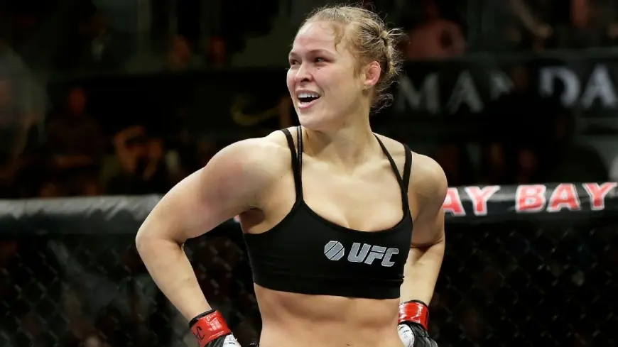 Ronda Rousey to face gina carano in blockbuster May 16 return to MMA