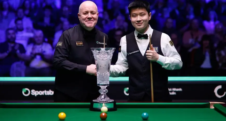 Snooker: Zhao Xintong beats John Higgins to win Players Championship