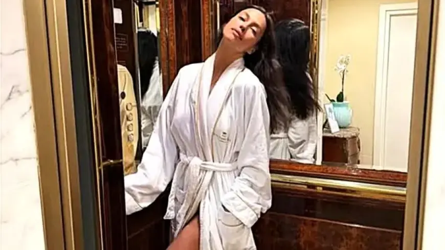 Irina Shayk Stuns in White Robe During Sanremo 2026 Appearance