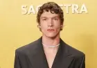 Connor Storrie Accessorizes His Plunging Suit With a Diamond Choker at the 2026 Actor Awards