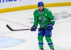 Sharks acquire defenseman Jett Woo; Canucks trade jett woo