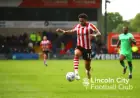 Ex-Lincoln City Star Ejected After On-Field Teammate Clash