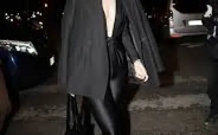 Olivia Wilde Stuns in Plunging Black Catsuit That Dips to Her Stomach During Paris Fashion Week Night Out