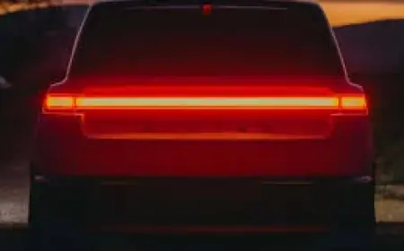 Rivian R2 Launch Looms as Cost Cuts Coincide with Large Net Losses