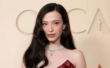 Mikey Madison Is Back on the Oscars Red Carpet Wearing a Deep Red Gown With a Long Slit