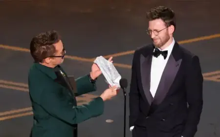 Robert Downey Jr. and Chris Evans Reunite for Avengers Moment at the Oscars