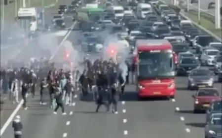 Ajax Fans Rally on Highway to Support Team Bus for Klassieker