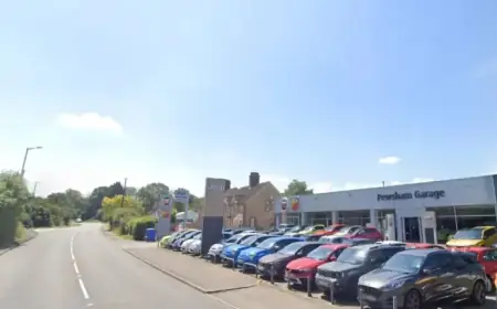 Land Rover Flees Scene After Collision Near Garage