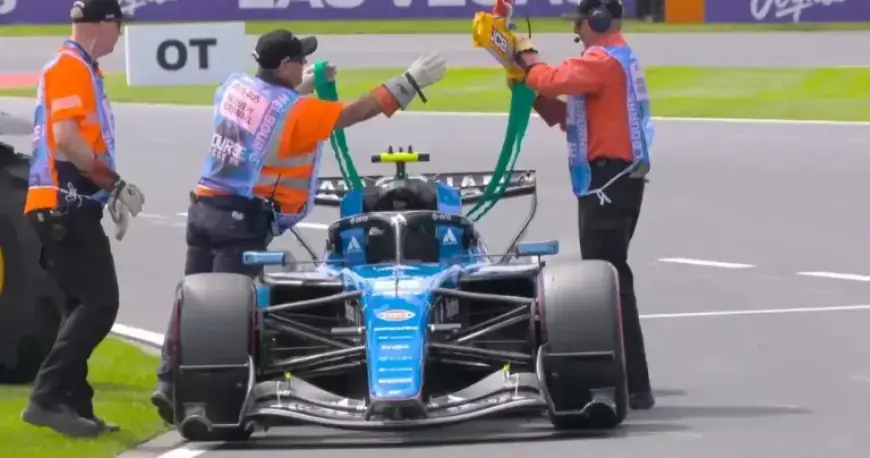 Red Flag Halts F1 Race as Car Breaks Down at Pit Entry