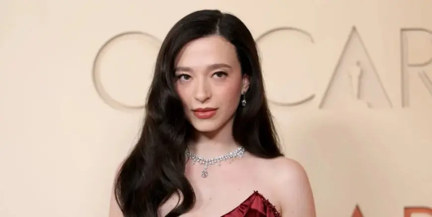 Mikey Madison Is Back on the Oscars Red Carpet Wearing a Deep Red Gown With a Long Slit