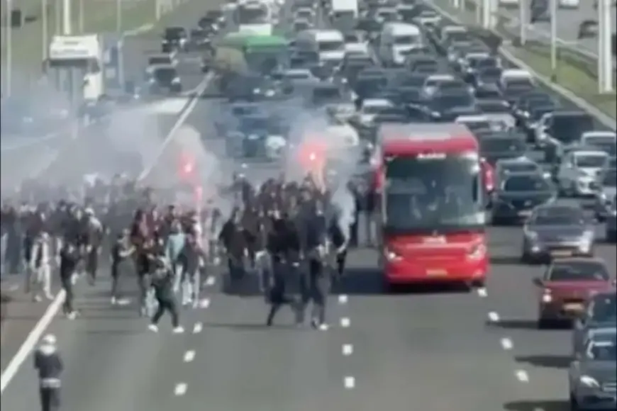 Ajax Fans Rally on Highway to Support Team Bus for Klassieker