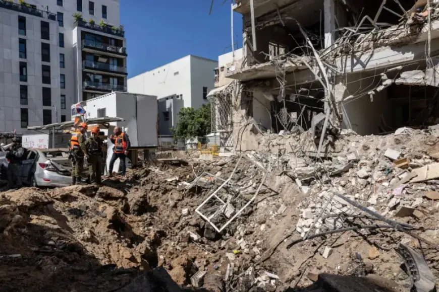 Israel and Iran Exchange Strikes; U.S. Halts Energy Target Attacks