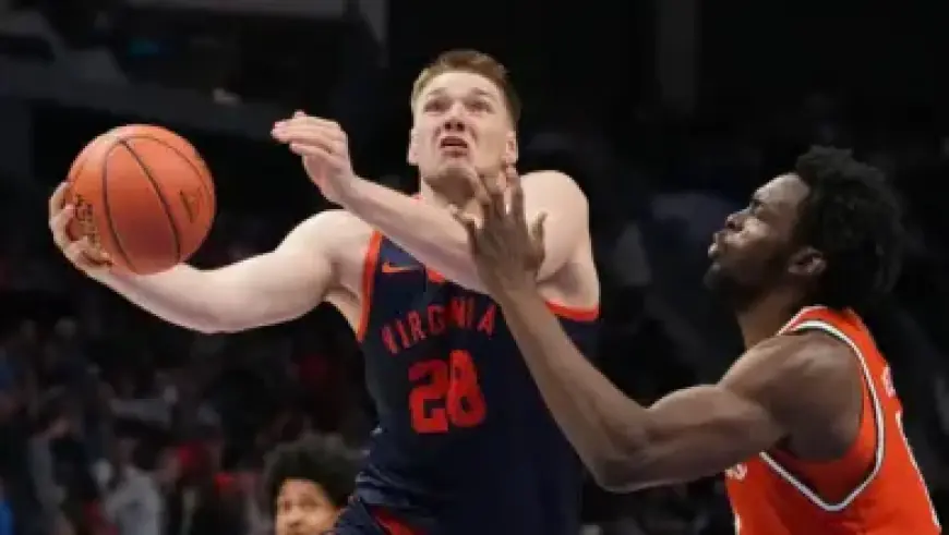 Marshall Manning Sparks Quarterback Excitement in Latest Video