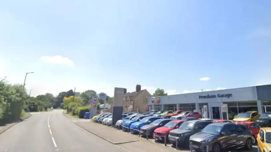 Land Rover Flees Scene After Collision Near Garage