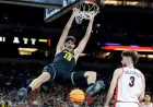 Michigan Dominates Arizona in Final Four, Advances to Face UConn for Title
