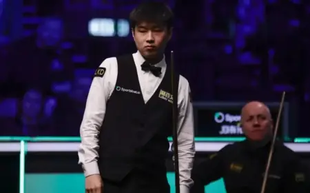 Zhao Dominates Higgins with Impressive 8-0 Lead