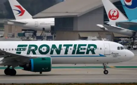 Frontier Airlines Jet Abruptly Stops as Trucks Cross Path at LAX