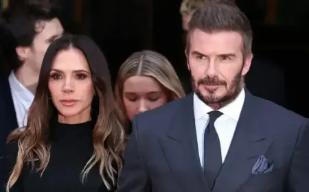 Victoria Beckham Stuns in Cut-Out Swimsuit with Shirtless David
