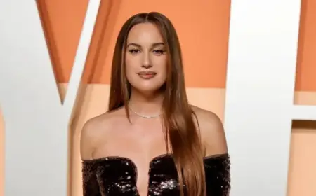 Hannah Berner Stuns in Bikini with Stylish Shirt for SI Swimsuit 2026