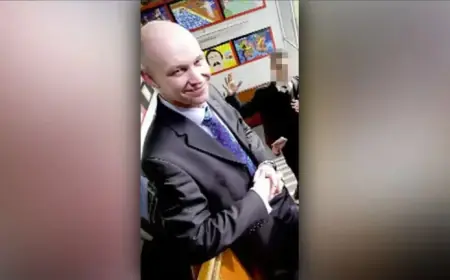 Stretford Grammar Headteacher Michael Mullins Dies in Crash; Four Arrested