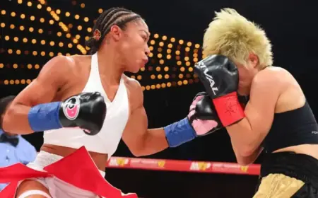 Baumgardner Holds Title; Green Suffers Upset Injury Defeat