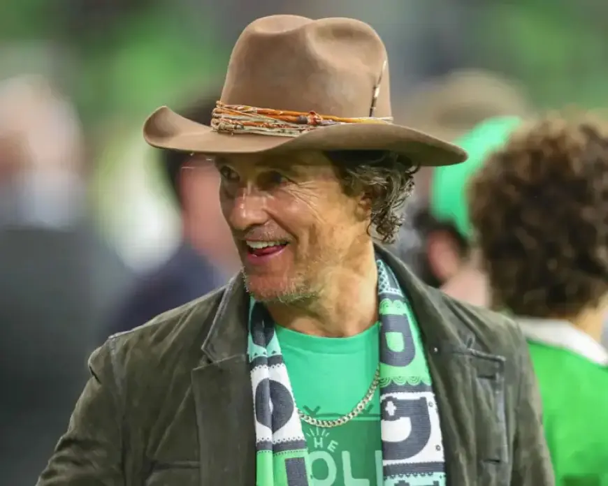 Matthew McConaughey Stuns in Fluffy Blonde Pigtails and Pink Feather Robe