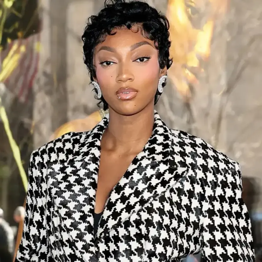 Angel Reese Embraces Atlanta Dream Era in Black-and-White Houndstooth Skirt Set