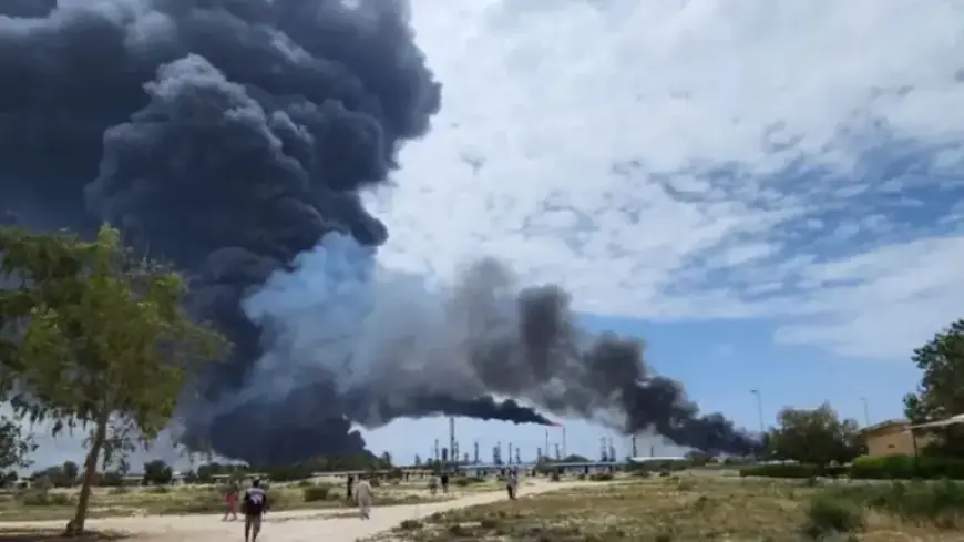 Iran Refinery Hit Amid Ceasefire; Tehran Retaliates Against Kuwait, UAE