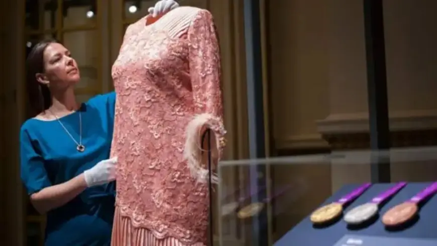 Queen Elizabeth II’s Olympic Stunt Outfit Showcased in Fashion Exhibition
