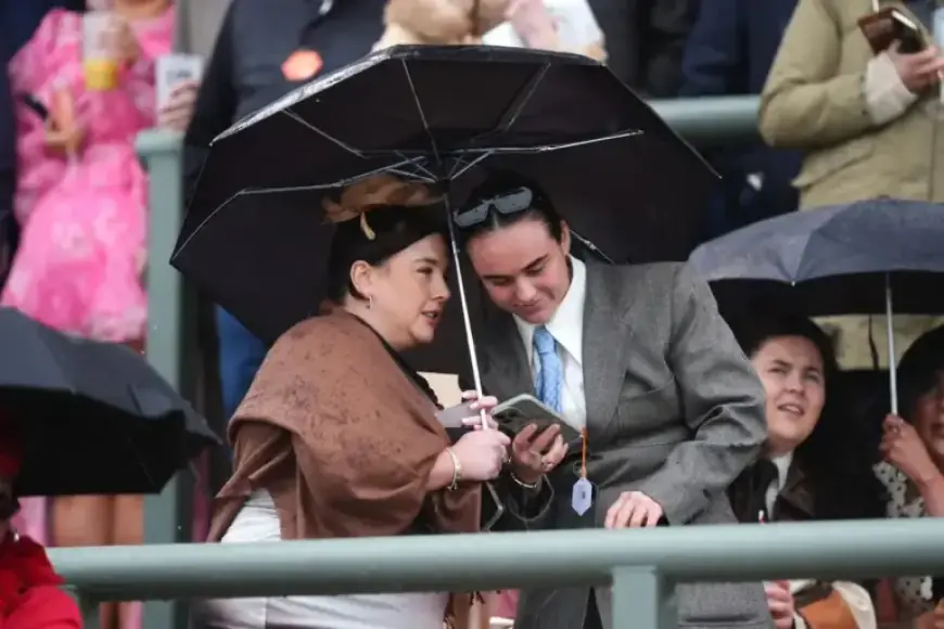 Fans Defy Weather at Aintree for Grand National Excitement