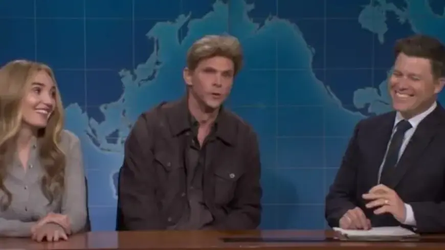 Colin Jost Reacts to SNL Costar’s Chest Tattoo of Scarlett Johansson