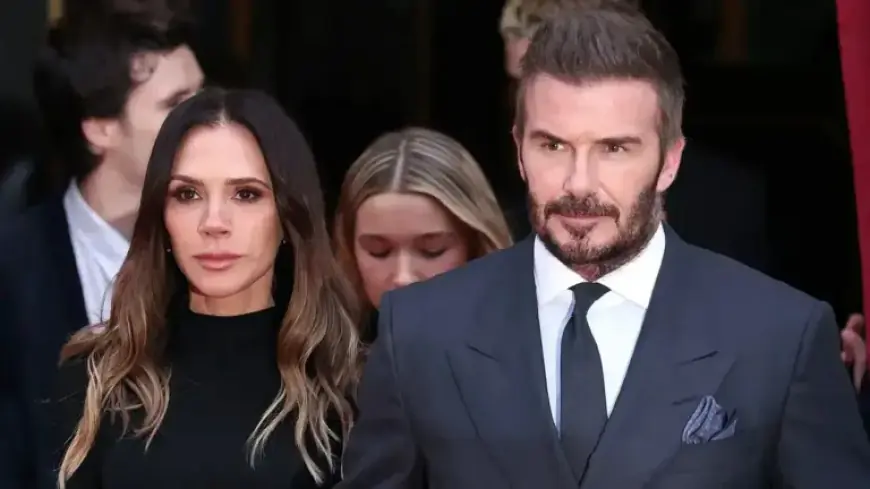 Victoria Beckham Stuns in Cut-Out Swimsuit with Shirtless David