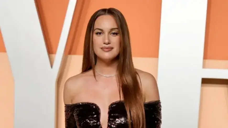 Hannah Berner Stuns in Bikini with Stylish Shirt for SI Swimsuit 2026