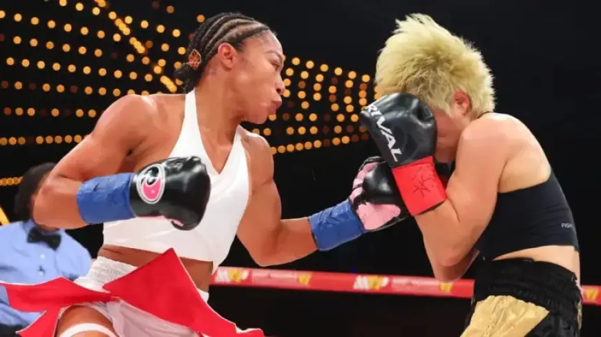 Baumgardner Holds Title; Green Suffers Upset Injury Defeat